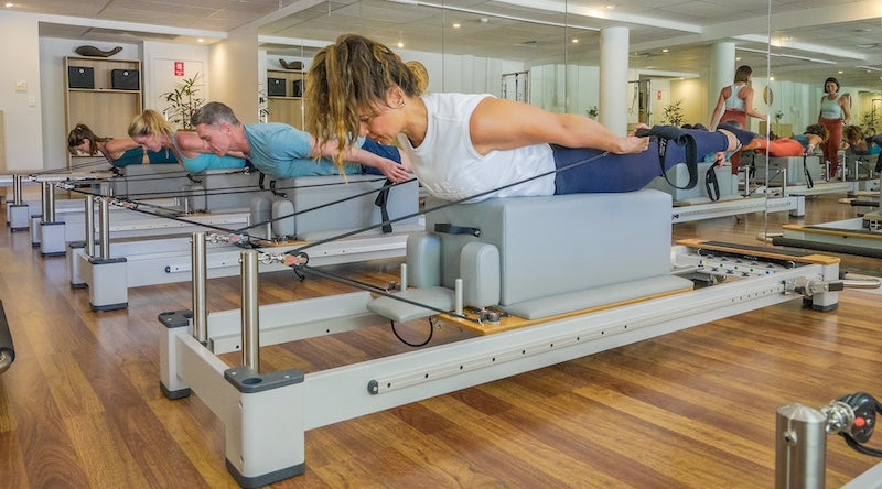 Top Reformer Pilates Arm Workouts to Attract Clients